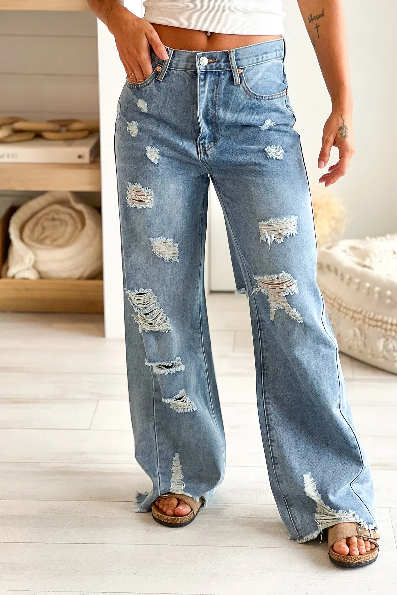 Mid Rise Wide Fit Distressed Denim Jeans